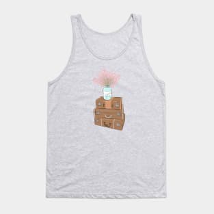 Pile of baggage with a jar with flowers Tank Top